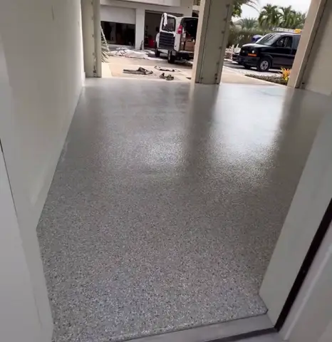 View of a newly finished gray epoxy floor from doorway