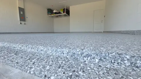 Detailed view of a gray epoxy garage floor finish