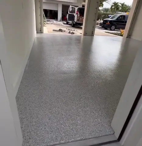 View of a newly finished gray epoxy floor from doorway