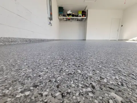 Wide view of a polished gray epoxy garage floor