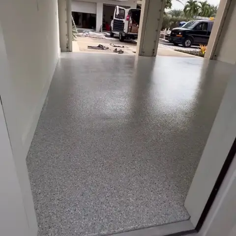 View of a newly finished gray epoxy floor from doorway